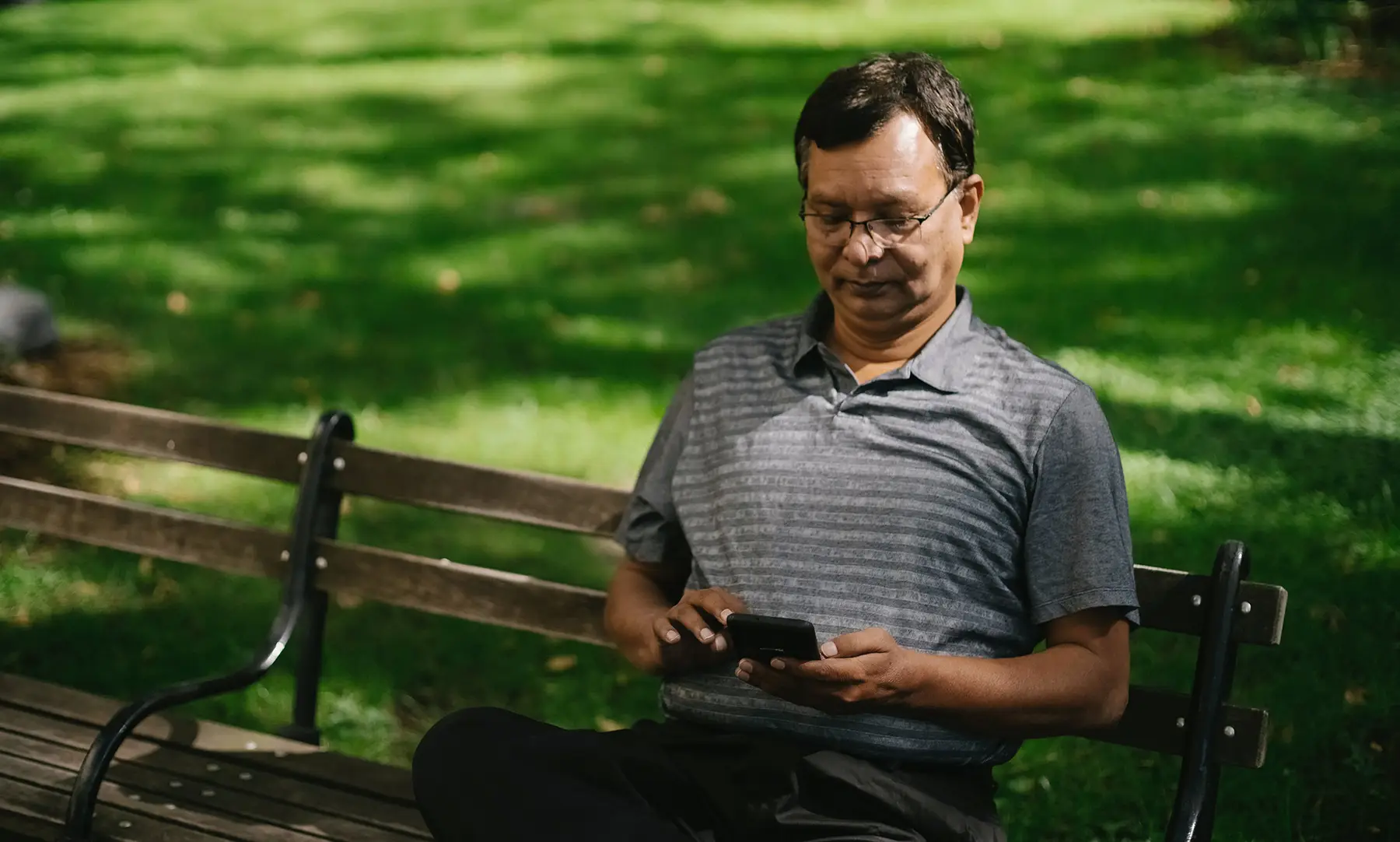 dcx-met-office-man-checks-weather-on-phone